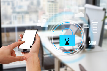 Cyber security network concept. Hand using smartphone with master key connect world networking virtual graphic and binary coded background.