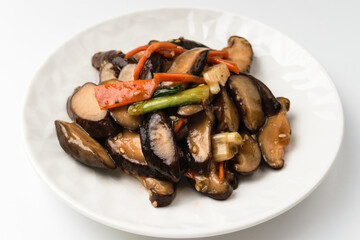 Wall Mural - Stir-fried mushrooms on a white background