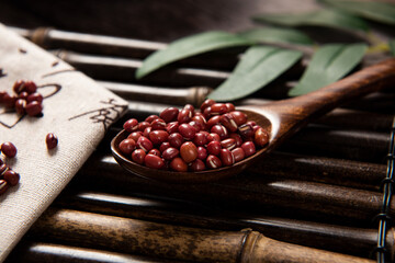 Wall Mural - azuki beans , red beans on wooden background