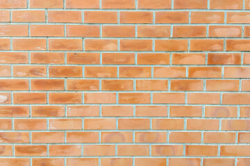 Wall Mural - close up on retro grunge orange brick wall background for architectural exterior buildings material concept.