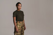 © Drobot Dean - Confident african american soldier woman posing and looking at camera