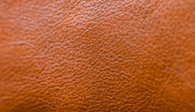 Selective Focus Shot Of Orange Leather Texture