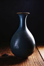 Close-up Of Vase On Table