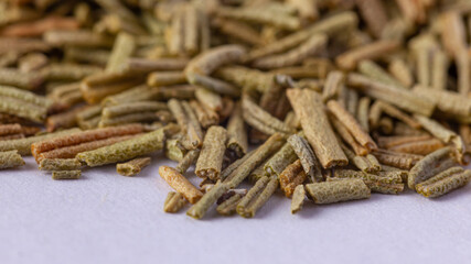 Wall Mural - Pile of dried rosemary leaves isolated on white background. condiments