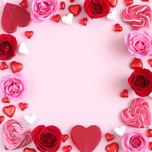 Valentine's Day Background Of Pink And Red Roses And Heart Shaped Candies. Mothers Day, Birthday, Valentines Day, Womens Day, Love Concept. Space For Text.