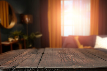 Wall Mural - a wooden table in the living room on a moody evening