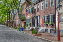 Philadelphia Street Scene In Historical Society Hill Section Of The City.  Showing Colonial Homes On A Cobblestone Street.