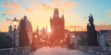 Fototapeta Londyn - Charles Bridge at dawn: silhouettes of Old Bridge Tower, churches and spires of Old Prague on a sunrise, panoramic image.