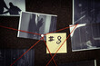 © New Africa - Detective board with crime scene photos, sticker, clues and red thread, closeup