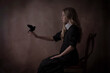 Gothic girl holding a crow