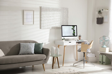 Poster - Comfortable office chair near desk with modern computer indoors