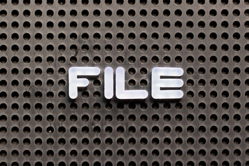 Sticker - White color letter in word file on black pegboard background