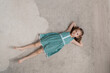 © arthurhidden - Cute preschool girl making funny faces, playing, having fun while lying on the soft carpet at home