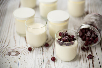 Poster - Homemade sweet yogurt with frozen berries in a glass