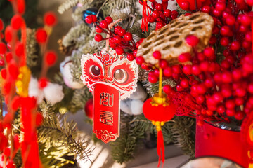 Wall Mural - chinese traditional dancing lion hanging for New Year,calligraphy translation:good bless