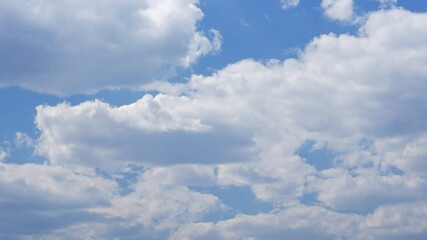 Wall Mural - Blue sky background with white clouds. Soft white clouds timelapse