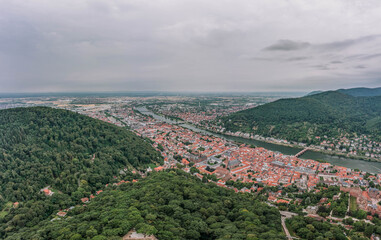 Wall Mural - Aerial drone shot of Heidelberg from Konigstuhl hill in overcast summer morning