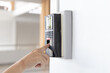 © Puwasit Inyavileart - Finger print scan, Male employees press sensors to record company attendance time and after work, Time Recorder Attendance - Out work, Encryption for identity verification or electronic signing