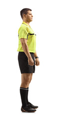 Wall Mural - Full length profile shot of a serious footall referee