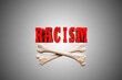 Racism letters with Crossbones demonstrating Racism danger and discrimination risk or death concept. 3D illustration