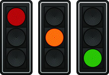 Three Sets Of LED Traffic Lights Showing Red, Amber Or Green Lights.
