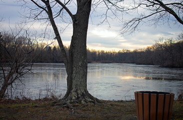 Sunset over Etra lake in East Windsor, New Jersey, on a cold and cloudy winter afternoon -01