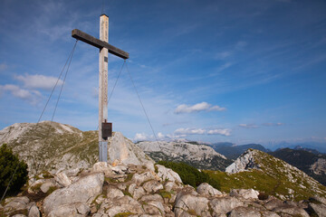 Summit cross on Traweng mountain in Austrian Alps. Tauplitz surroundings.