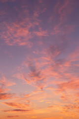 Wall Mural - Dramatic soft sunrise, sunset, pink violet orange sky with bright clouds in sunlight background texture