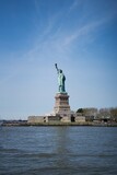 Fototapeta Miasta - Liberty Island with New York Cityscape in the background, Statue of Liberty