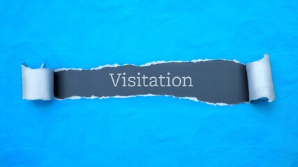 Visitation. Blue torn paper banner with text label. Word in gray hole.