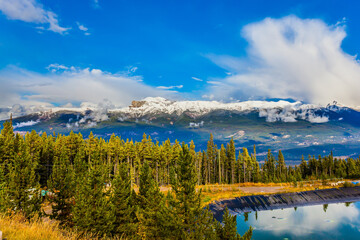 Wall Mural -  The lake among the snow covered mountains