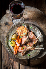 Wall Mural - Grilled ribs of lamb with vegetables with red wine