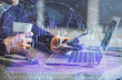© peshkova - Double exposure of man's hands holding and using a phone and financial graph drawing. Analysis concept.