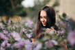 © nicoletaionescu - Happy Girl Surrounded by Flowers in Summer Season