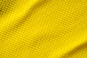 Yellow sports clothing fabric football shirt jersey texture close up