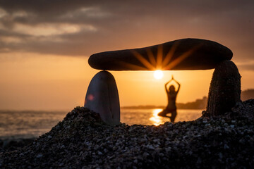 stone dolmen for meditation on the beach at sunset