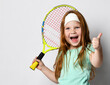 Happy excited girl big tennis player gesturing thumbs-up showing enjoyment of good game match or training headshot studio portrait isolated on white copy space. Positive emotion, sport activity