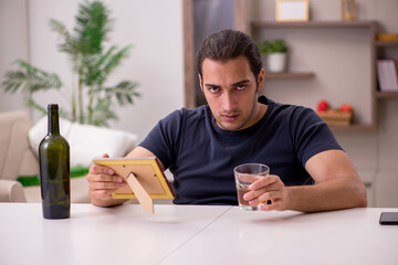 Poster - Young male alcoholic suffering from unhappy love at home