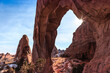 © Stephen - Sunbeam through Pine Tree Arch, Arches National Park, Utah