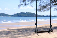 View Of Swing On Beach Against Sky