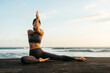 © Margo Basarab - young beautiful woman meditation on beach. Bali Indonesia.