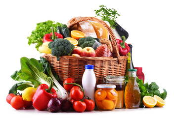 Fototapete - Wicker basket with assorted grocery products