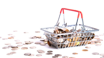 Metal basket with metal money coins on white background - multicurrency basket concept