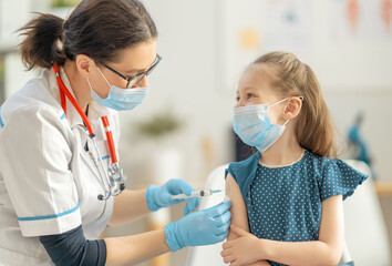 Wall Mural - Doctor vaccinating child