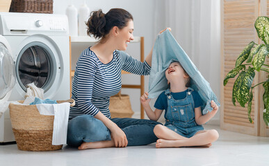 Wall Mural - family doing laundry