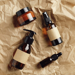 Wall Mural - cosmetic dark amber glass bottles on kraft paper. spa natural organic beauty products packaging desi