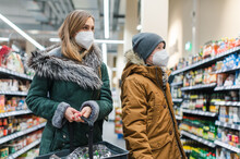 Family Shopping In Supermarket During Covind19 Pandemic