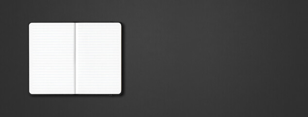 Poster - Black open lined notebook isolated on dark background. Horizontal banner