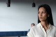 © Wavebreak Media - Portrait of mxed race businesswoman standing in a modern office