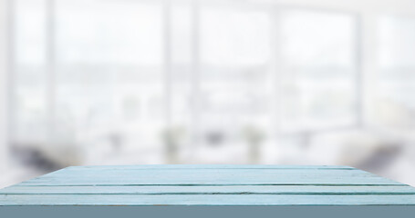 empty wooden table on background of abstract blur white interior, montage, product display, inside and window..